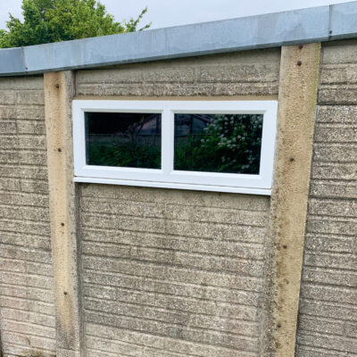 Replacement windows in a garden outbuilding